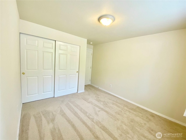 2218 143rd Street Ct S, Spanaway, WA 98387 - unfurnished bedroom with light colored carpet and a closet
