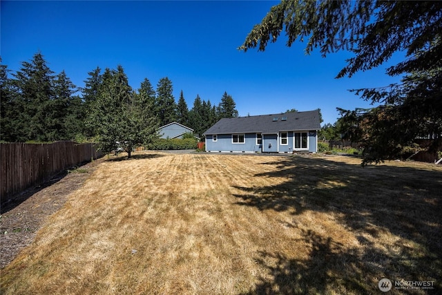 2218 143rd Street Ct S, Spanaway, WA 98387 - rear view of property featuring a fenced backyard