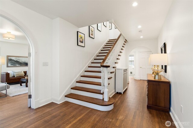817 E Shelby St, Seattle, WA 98102 - stairway with arched walkways, wood finished floors, and recessed lighting