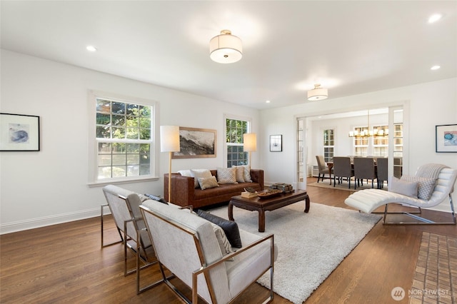 817 E Shelby St, Seattle, WA 98102 - living room with dark wood-style floors, a chandelier, and recessed lighting