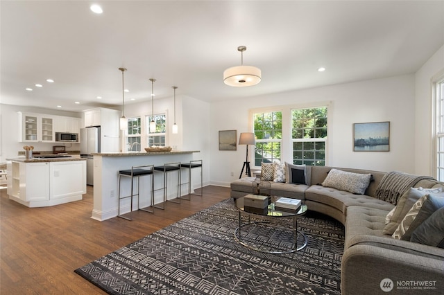 817 E Shelby St, Seattle, WA 98102 - living room featuring plenty of natural light, dark wood-type flooring, and recessed lighting