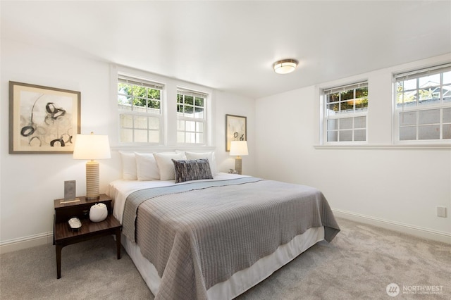 817 E Shelby St, Seattle, WA 98102 - carpeted bedroom featuring multiple windows
