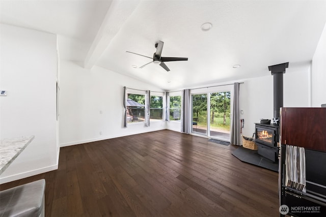 32205 71st Ave S, Roy, WA 98580 - unfurnished living room featuring ceiling fan, dark wood-style floors, and a wood stove