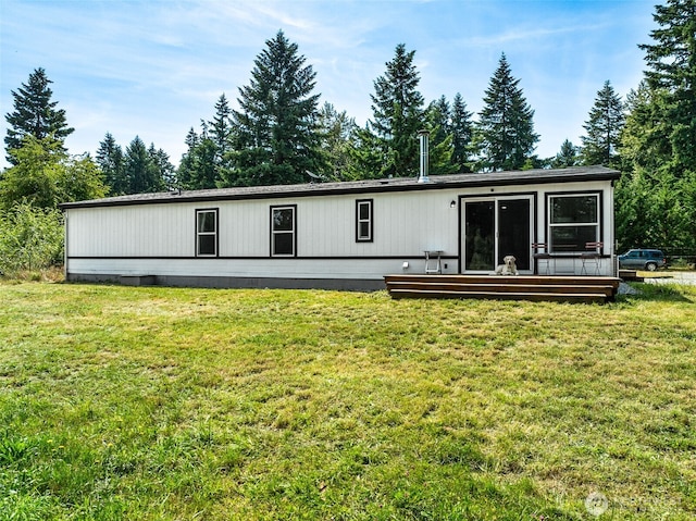 32205 71st Ave S, Roy, WA 98580 - back of house featuring a yard and a wooden deck