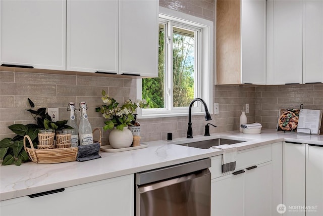 320 178th Pl SW, Bothell, WA 98012 - kitchen featuring stainless steel dishwasher, white cabinetry, decorative backsplash, and light stone countertops