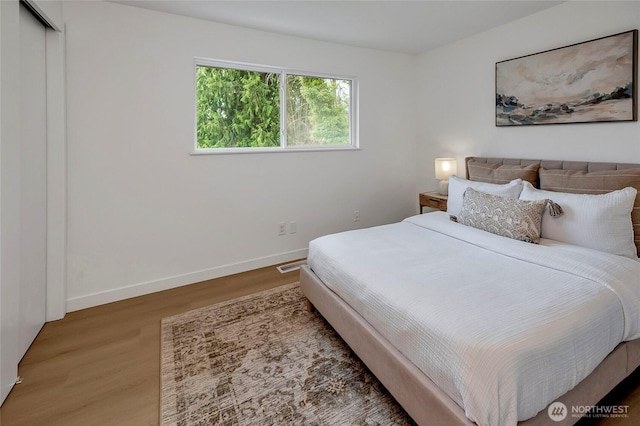 320 178th Pl SW, Bothell, WA 98012 - bedroom featuring wood finished floors and a closet