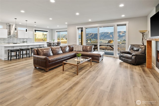 101 Wren Loop SW, Mattawa, WA 99349 - living area with recessed lighting, light wood-type flooring, and healthy amount of natural light