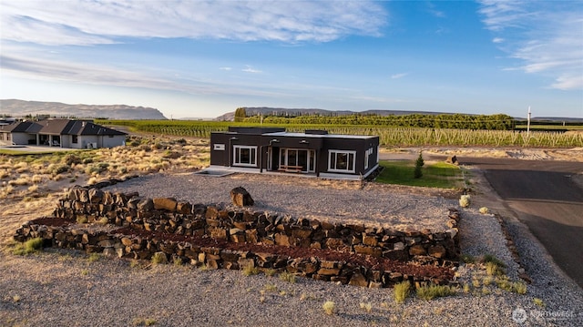 101 Wren Loop SW, Mattawa, WA 99349 - rear view of house with a mountain view and a view of countryside