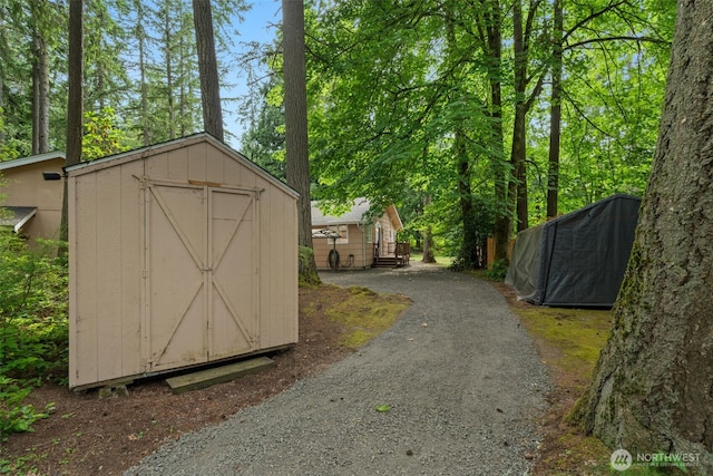 9390 NE Wardwell Rd, Bainbridge Island, WA 98110 - view of shed with asphalt driveway