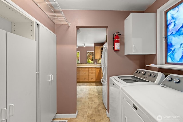 9390 NE Wardwell Rd, Bainbridge Island, WA 98110 - laundry room with separate washer and dryer