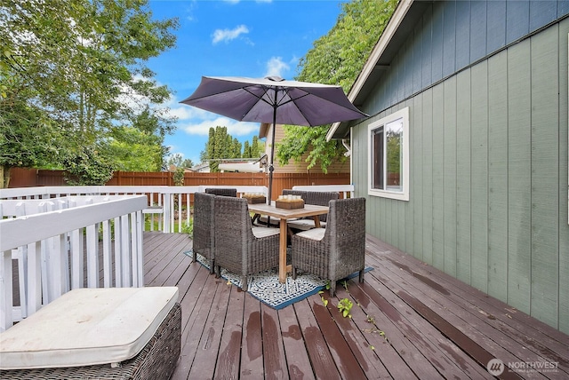 10208 D St E, Tacoma, WA 98445 - wooden terrace featuring outdoor dining space and a fenced backyard