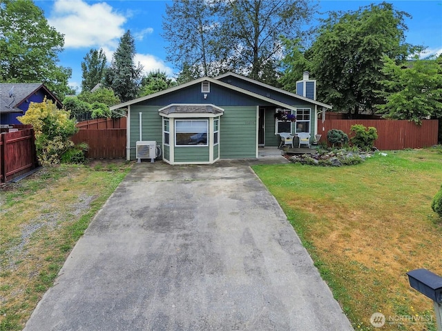 10208 D St E, Tacoma, WA 98445 - bungalow-style home with driveway and a chimney
