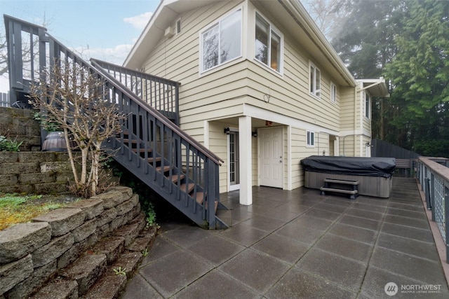 5467 16th Ave SW, Seattle, WA 98106 - view of patio / terrace featuring a hot tub, stairs, and a wooden deck
