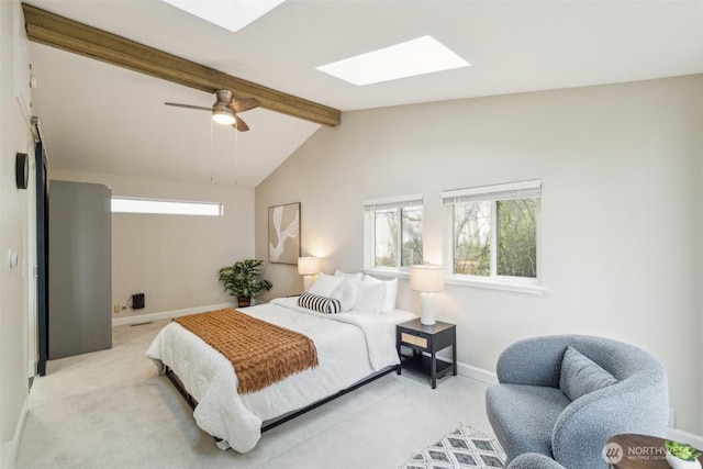 5467 16th Ave SW, Seattle, WA 98106 - bedroom featuring a skylight, light carpet, and ceiling fan