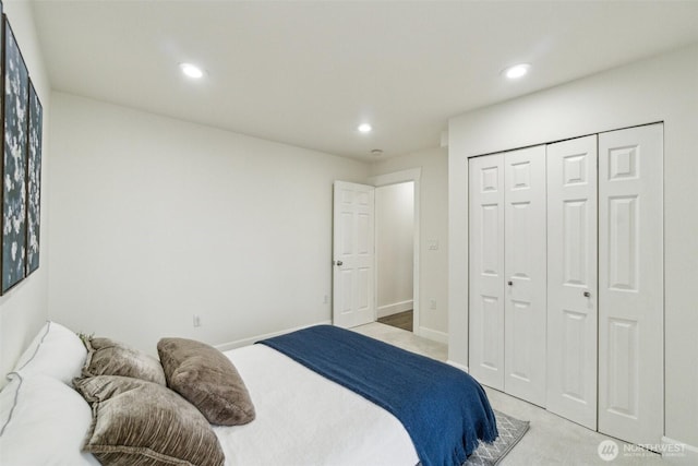 5467 16th Ave SW, Seattle, WA 98106 - bedroom featuring light carpet, recessed lighting, and a closet