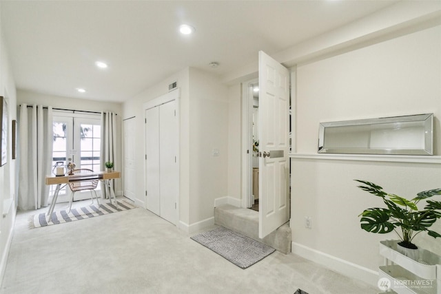 5467 16th Ave SW, Seattle, WA 98106 - interior space featuring light colored carpet, french doors, and recessed lighting