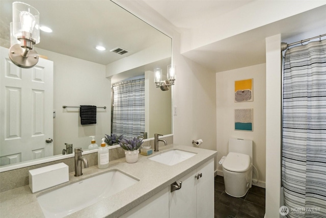 5467 16th Ave SW, Seattle, WA 98106 - full bathroom featuring double vanity, recessed lighting, tile patterned flooring, and a shower with shower curtain