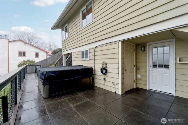5467 16th Ave SW, Seattle, WA 98106 - view of patio / terrace with a hot tub, area for grilling, and stairway