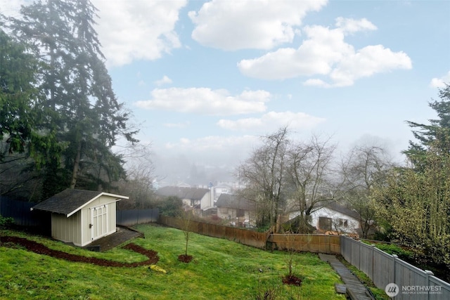 5467 16th Ave SW, Seattle, WA 98106 - fenced backyard featuring a storage unit