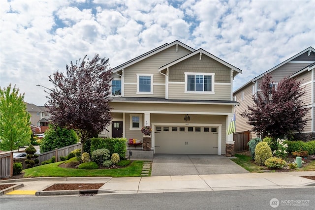 1448 101st Ave SE, Lake Stevens, WA 98258 - craftsman-style house featuring an attached garage, concrete driveway, and stone siding