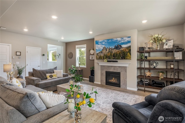 1448 101st Ave SE, Lake Stevens, WA 98258 - living room featuring wood finished floors, a tile fireplace, and recessed lighting