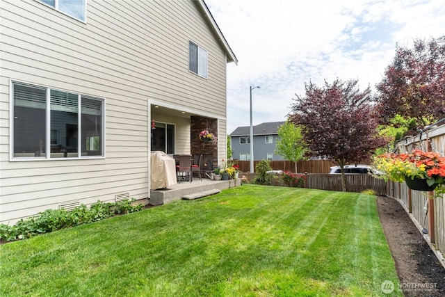 1448 101st Ave SE, Lake Stevens, WA 98258 - fenced backyard with a patio area