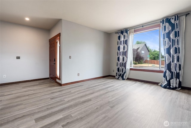 15204 Kayla St SE, Yelm, WA 98597 - spare room with wood finished floors and recessed lighting