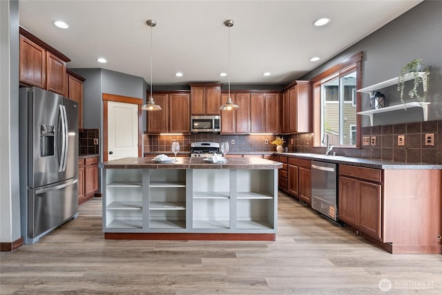 15204 Kayla St SE, Yelm, WA 98597 - kitchen with open shelves, appliances with stainless steel finishes, light wood-type flooring, and recessed lighting