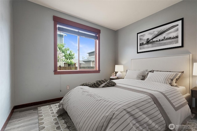 15204 Kayla St SE, Yelm, WA 98597 - bedroom with wood finished floors and baseboards