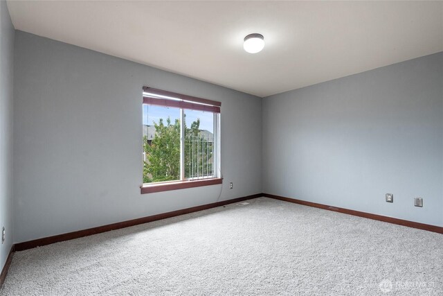 15204 Kayla St SE, Yelm, WA 98597 - empty room featuring carpet floors