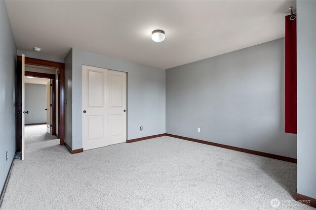 15204 Kayla St SE, Yelm, WA 98597 - unfurnished bedroom with carpet and a closet