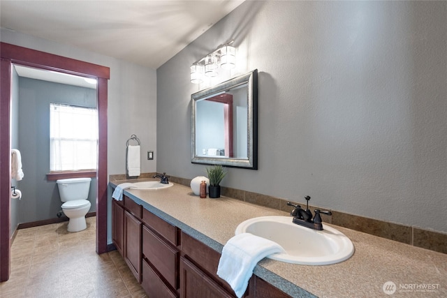 15204 Kayla St SE, Yelm, WA 98597 - bathroom featuring double vanity and toilet