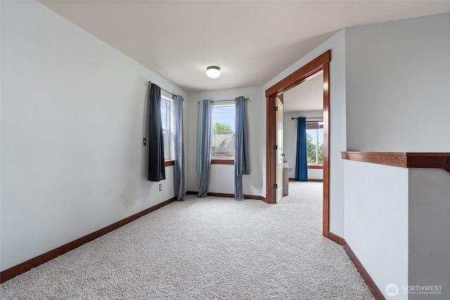 15204 Kayla St SE, Yelm, WA 98597 - empty room featuring carpet floors and baseboards