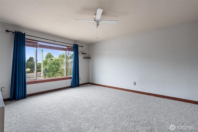 15204 Kayla St SE, Yelm, WA 98597 - empty room with carpet floors and a ceiling fan