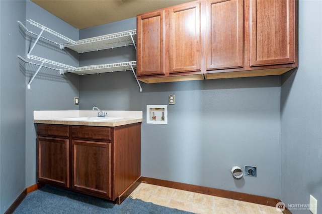 15204 Kayla St SE, Yelm, WA 98597 - washroom with cabinet space, electric dryer hookup, and hookup for a washing machine