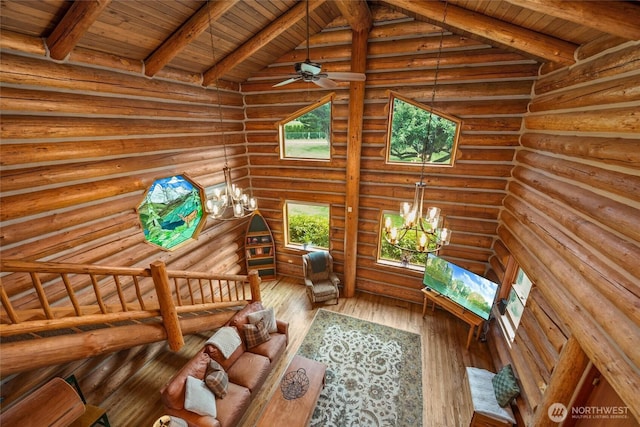 3130 S Bay Vista Dr, Sedro Woolley, WA 98284 - sitting room featuring hardwood / wood-style floors, wooden ceiling, a chandelier, and rustic walls