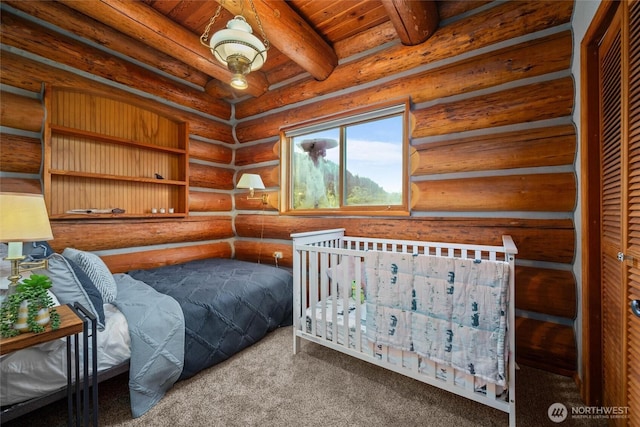 3130 S Bay Vista Dr, Sedro Woolley, WA 98284 - bedroom featuring carpet floors, a wooden ceiling with exposed beams, and rustic walls