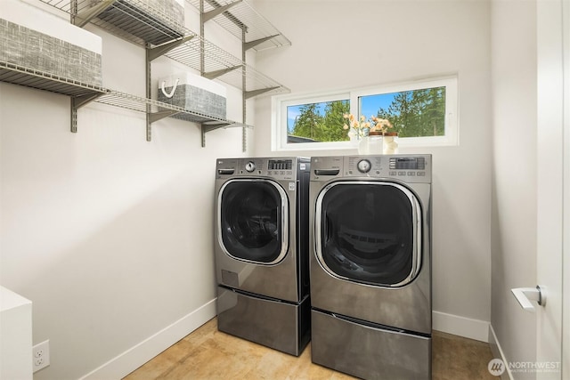 1408 Hinoki Walk NE, Issaquah, WA 98029 - washroom with washing machine and dryer and baseboards