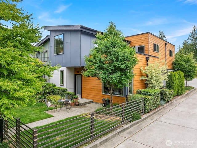 1408 Hinoki Walk NE, Issaquah, WA 98029 - contemporary home with board and batten siding and a patio