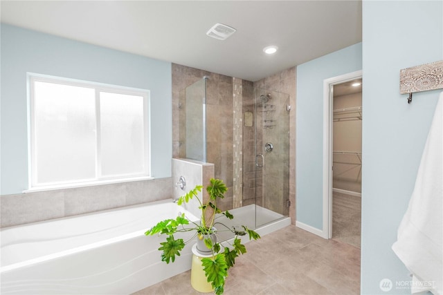 25613 204th Pl SE, Covington, WA 98042 - full bath with a stall shower, a bath, a spacious closet, recessed lighting, and tile patterned floors