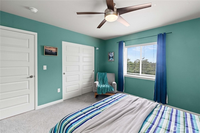 25613 204th Pl SE, Covington, WA 98042 - carpeted bedroom featuring a ceiling fan and baseboards