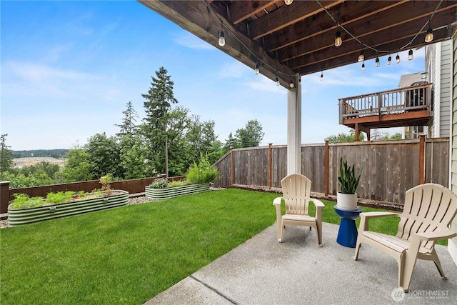 25613 204th Pl SE, Covington, WA 98042 - fenced backyard with a vegetable garden and a patio