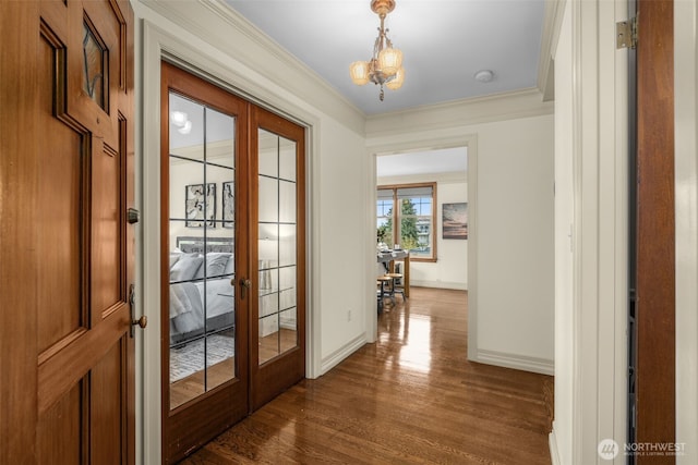 405 Prospect St Unit 201, Seattle, WA 98109 - doorway to outside with french doors, dark wood-style floors, a chandelier, and crown molding