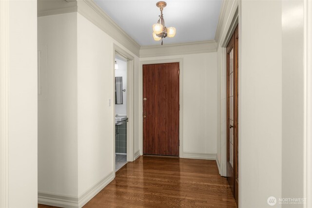 405 Prospect St Unit 201, Seattle, WA 98109 - corridor with dark wood-type flooring and crown molding