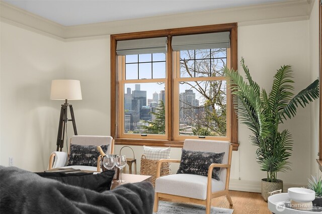 405 Prospect St Unit 201, Seattle, WA 98109 - living area with wood finished floors, ornamental molding, and a view of city