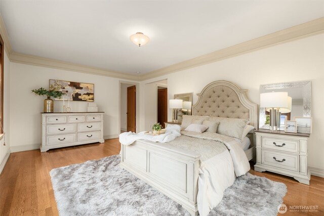 405 Prospect St Unit 201, Seattle, WA 98109 - bedroom with light wood-type flooring and ornamental molding