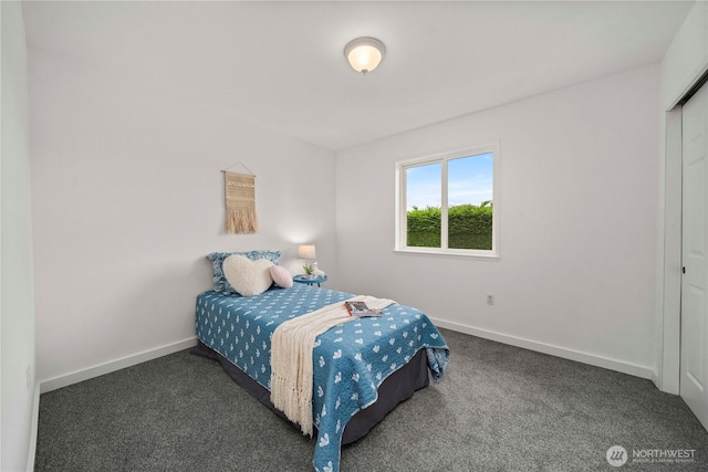 608 14th St SW, Puyallup, WA 98371 - carpeted bedroom featuring baseboards and a closet