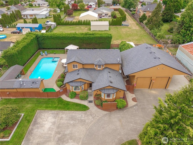 608 14th St SW, Puyallup, WA 98371 - aerial perspective of suburban area featuring a pool area