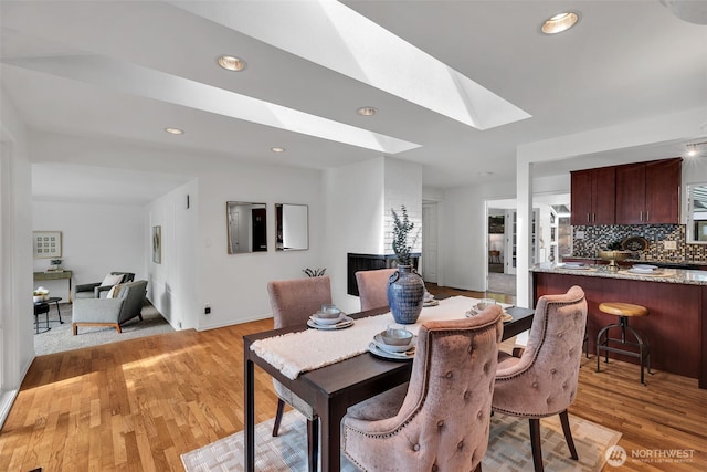 18256 45th Ave S, Seatac, WA 98188 - dining space with a skylight, light wood finished floors, and recessed lighting