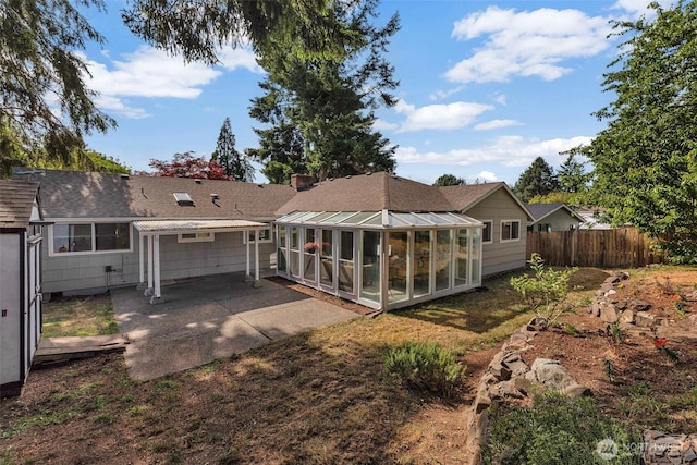 18256 45th Ave S, Seatac, WA 98188 - back of house featuring a sunroom, a patio area, roof with shingles, and a pergola